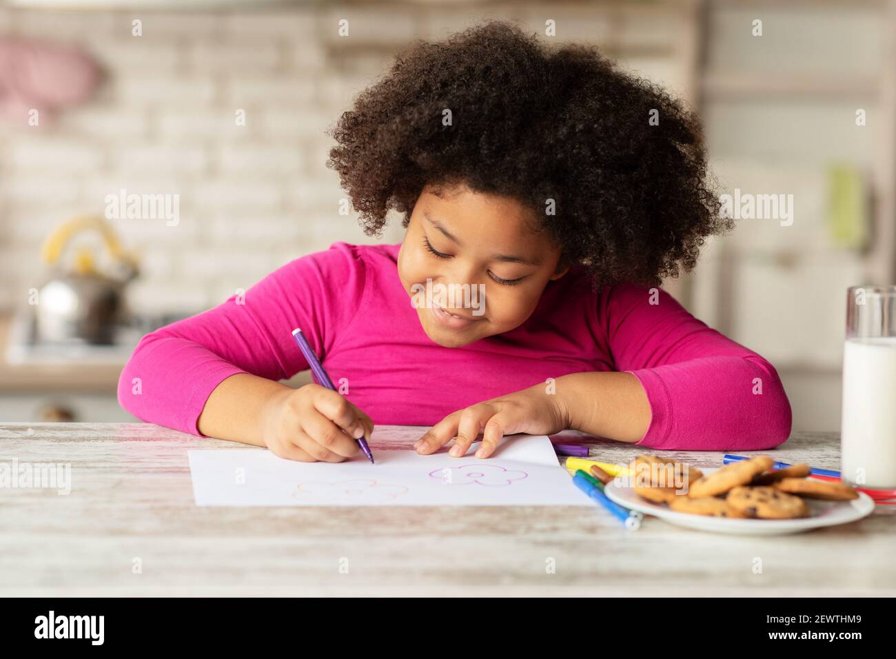Portrait Of Adorable Little African American Girl Drawing In Kitchen ...