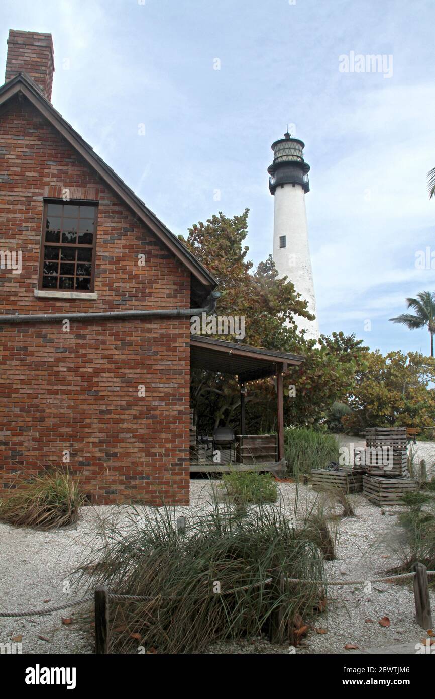 Key Biscayne, FL, USA. The Cape Florida Light & the keeper's cottage in Bill Baggs Cape Florida State Park. Stock Photo