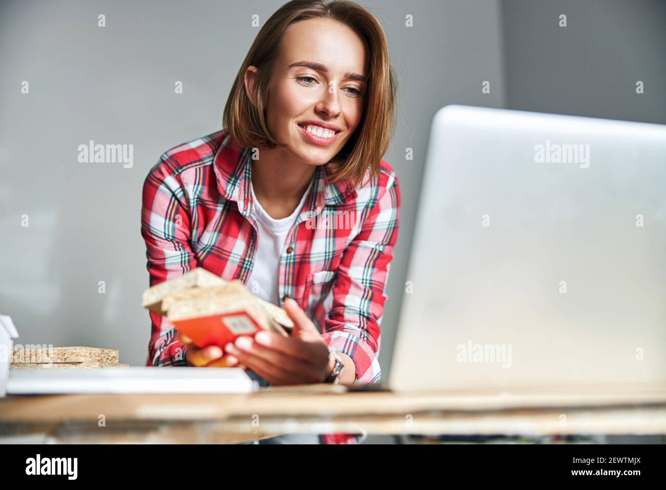 Interior designer holding paint samples on the mediumdensity