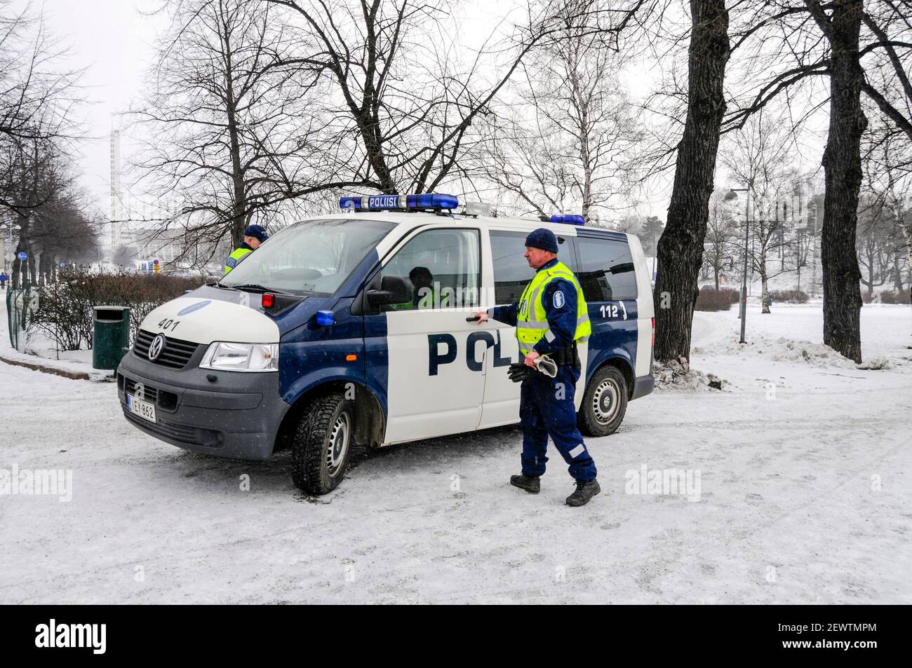 Two Finnish Police officers beside their Police van in Helsinki, Finland  Stock Photo - Alamy