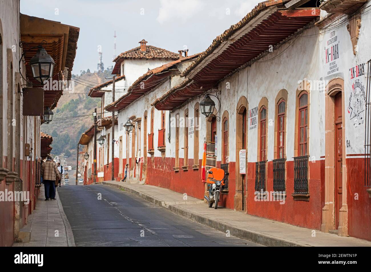 Traditional colonialindigenous red and white adobe houses and