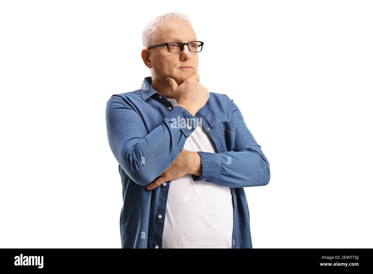 Pensive mature man looking in distance isolated on white background Stock Photo