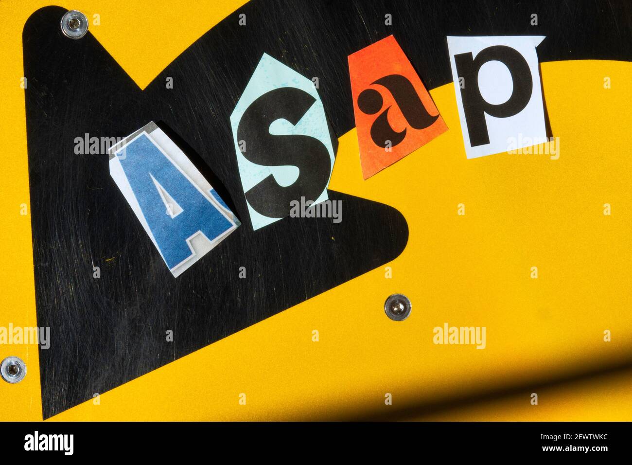 The acronym ASAP is short for 'as soon as possible' and is spelled out in ransom note style topography, USA Stock Photo