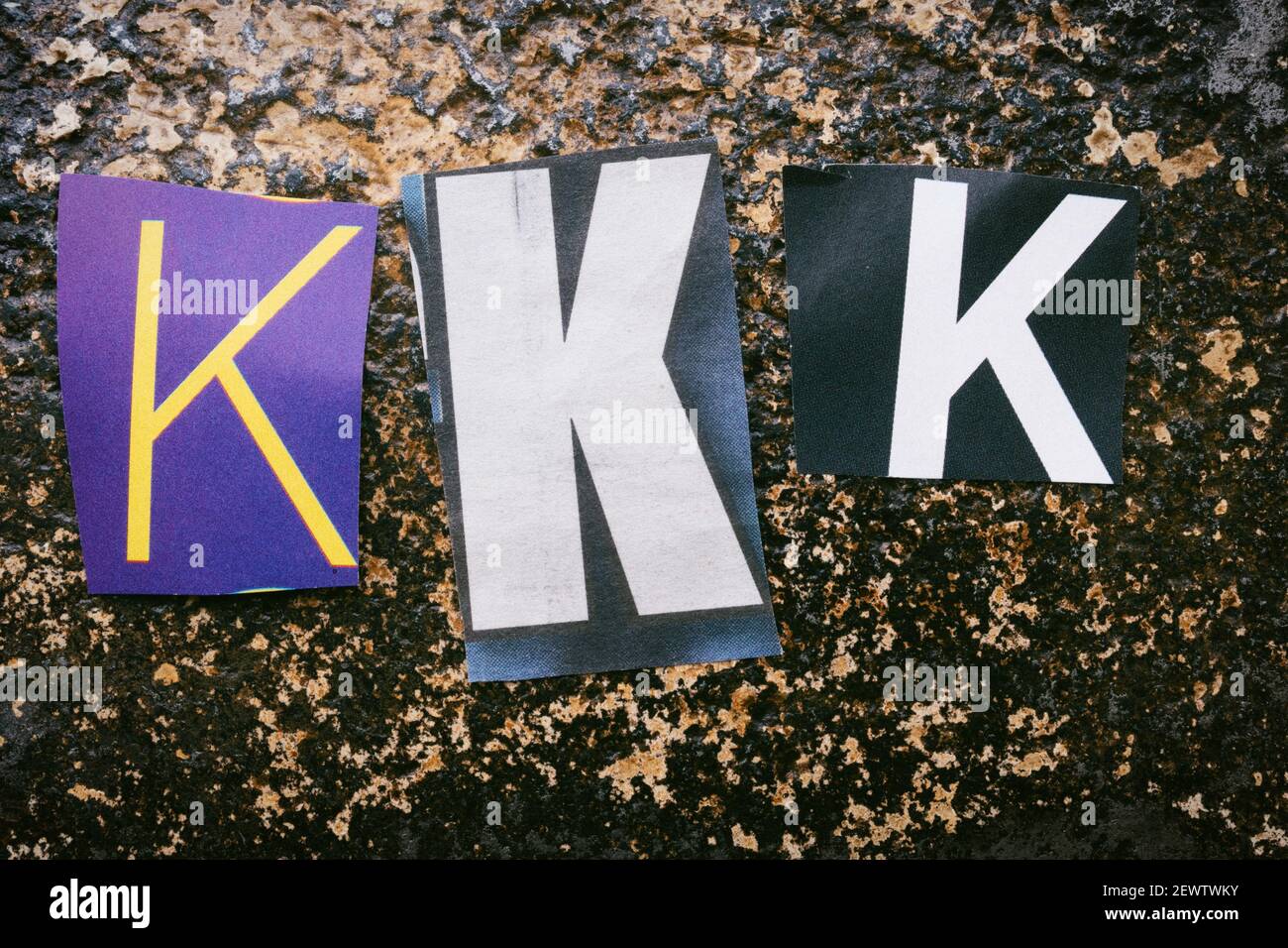 The acronym KKK is short for 'Ku Klux Klan' and is spelled out in ransom note style topography, USA Stock Photo