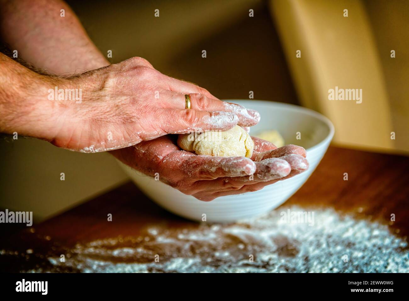 Preparing dough for white bread, rolls, pizza. Yeast dough made from