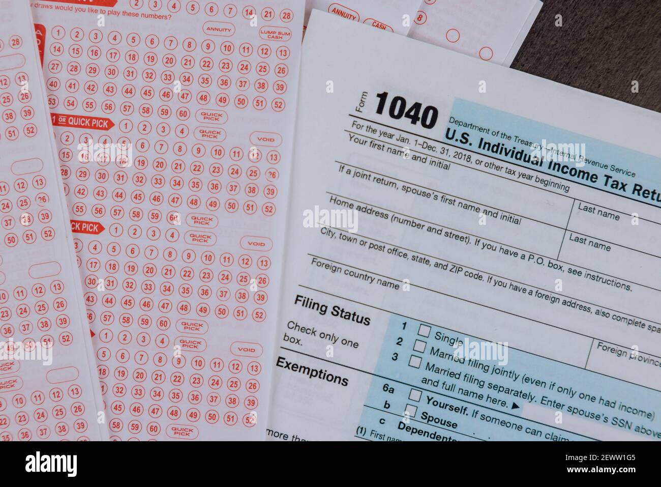 USA tax accounting office paperwork on 1040 form financial time tax form with payment taxes of government lottery Stock Photo