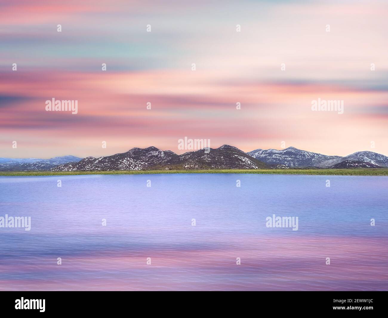 Scenic view of lake skadar and mountains at sunset, Lake in Europe. Stock Photo