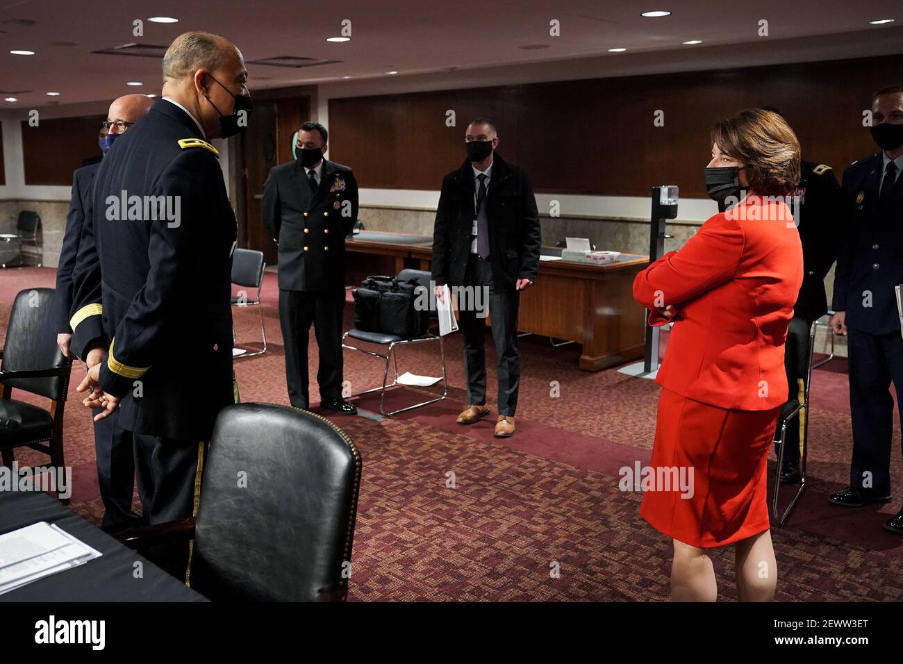 Army Maj. Gen. William Walker, Commanding General of the District of Columbia National Guard speaks to United States Senator Amy Klobuchar (Democrat of Minnesota), Chairman, US Senate Committee on Rules and Administrationafter a Senate Homeland Security and Governmental Affairs & Senate Rules and Administration joint hearing on Wednesday, March 3, 2021 to discuss the January 6th attack on the U.S. Capitol.Credit: Greg Nash/Pool via CNP | usage worldwide Stock Photo