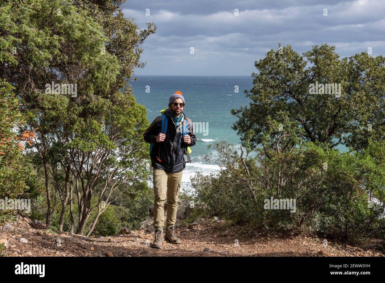 hiker with backpacks in the forest, nature walks Stock Photo - Alamy