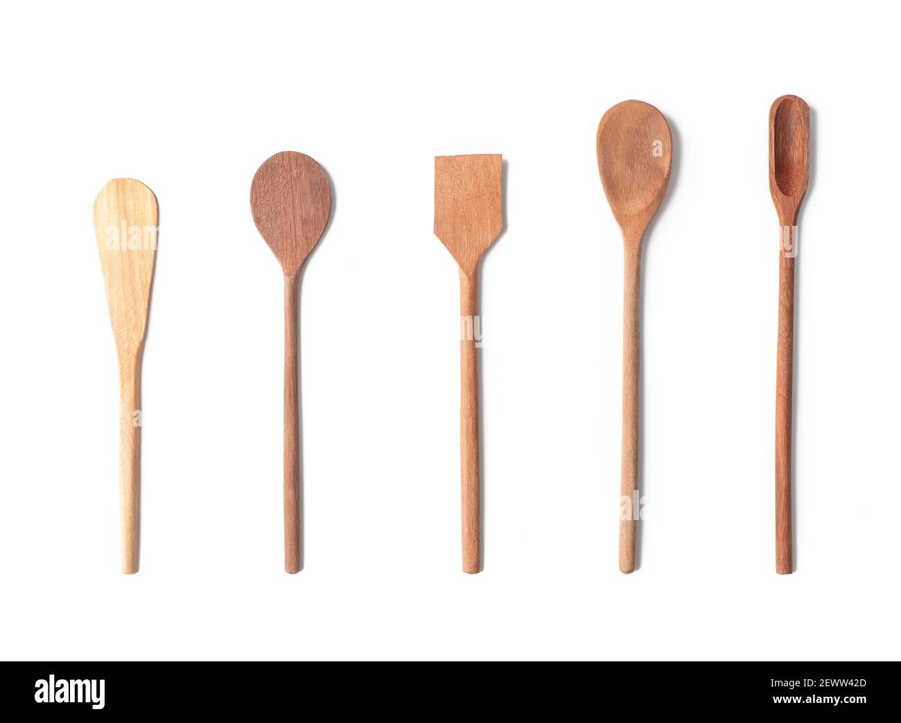 Wooden kitchen utensils isolated over white background Stock Photo - Alamy
