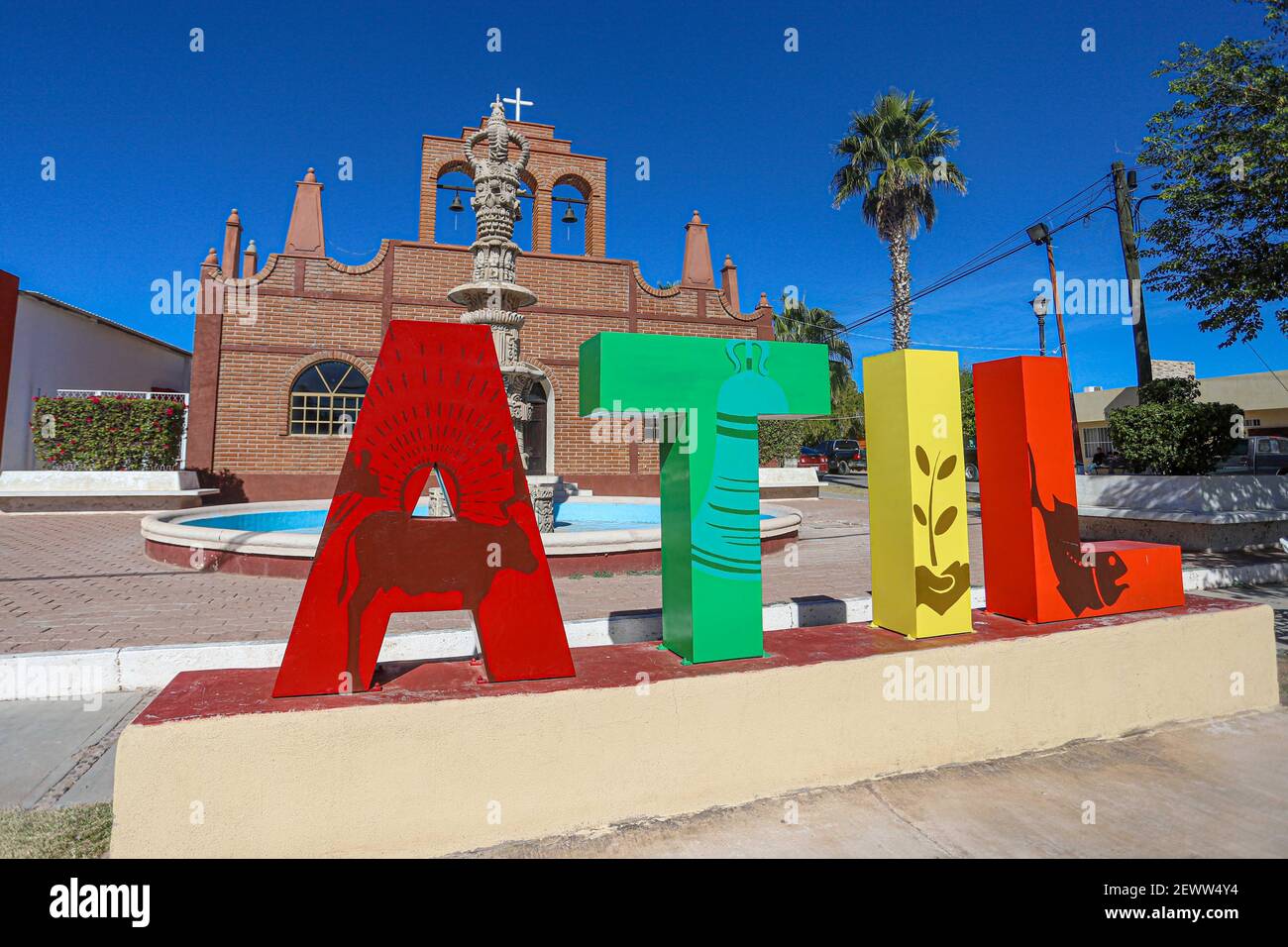 Monumental colored letters and Temple of San Francisco de Asís in Atil, Sonora Mexico. Atil small town in the northwest of the Mexican state of Sonora. The neighboring municipalities are Tubutama, Trincheras, Oquitoa and Altar. It was founded in 1751 Jesuit missionary Jacobo Sedelmayer. The first inhabitants were the Pima Alto or Nebome Indians. Atil means 'Arrowhead', in the Pima language.  (Photo by Luis Gutierrez / Norte Photo)  Letras monumentales de colores y Templo de San Francisco de Asís en Atil, Sonora Mexico. Átil pequeño pueblo en el noroeste del estado mexicano de Sonora.  Los muni Stock Photo