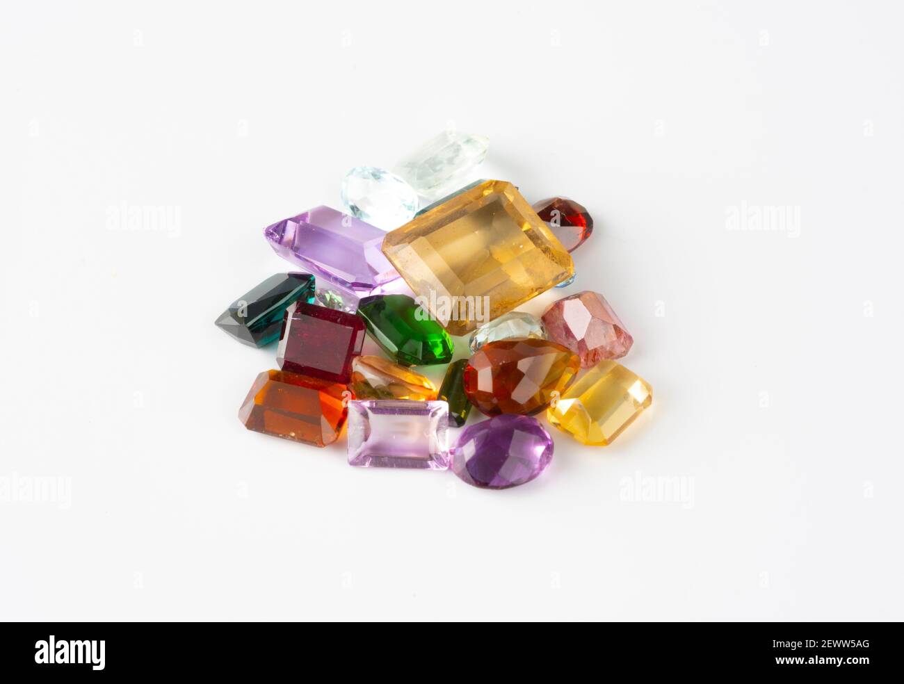 Group of precious stones and gems over white background. Stock Photo