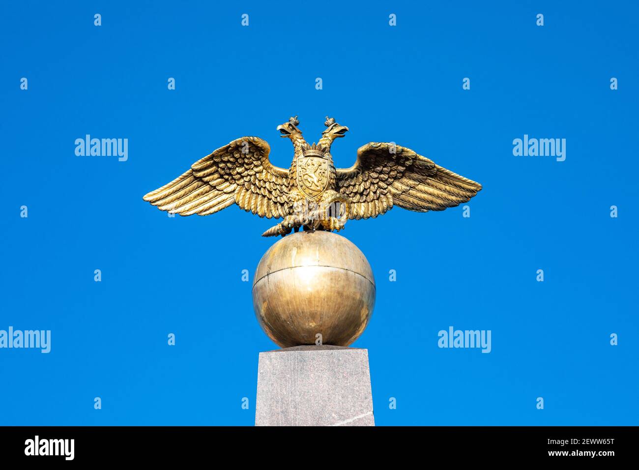 Stone of the Empress. Two-headed eagle of Russia on top of bronze globe. The monument was created by Carl Ludwig Engel in 1835. Helsinki, Finland. Stock Photo