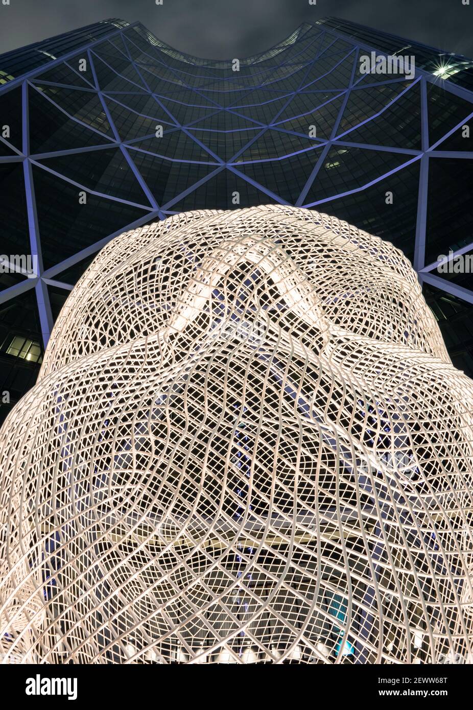 Calgary Alberta Canada, February 17 2021: The attractive Wonderland Sculpture under the Bow Tower at night in a Canadian city. Stock Photo