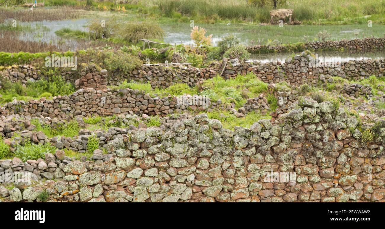 Pikillaqta archaeological site stone walls in ruins in Cusco, Peru Stock Photo