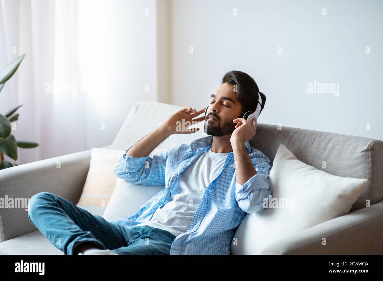 Arab Man Sitting In Sofa High Resolution Stock Photography and Images ...