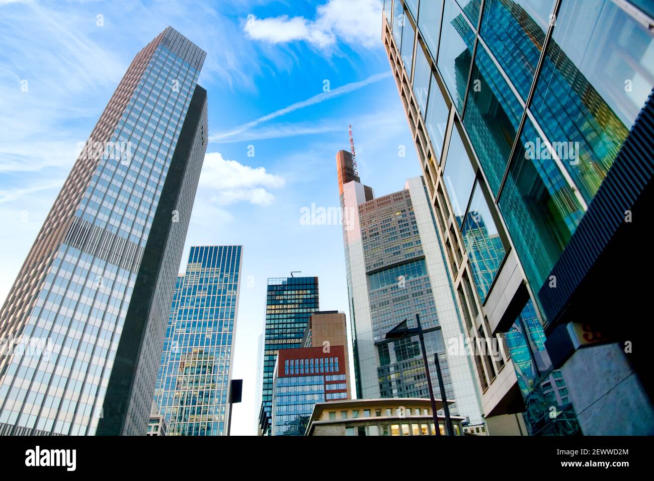 Falling skyscrapers rise to the blue sky in Frankfurt am Main Stock ...
