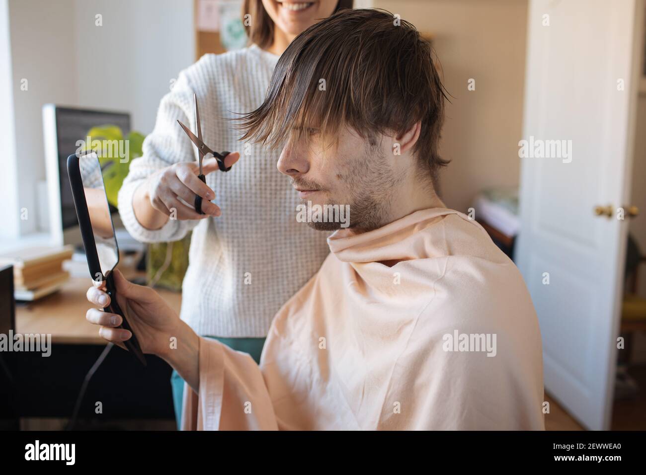 Home haircut. Man cutting hair at home. Life in pandemic during
