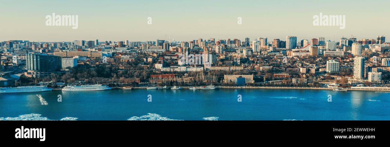 Rostov-on-Don city with Don river and many modern and historic buildings on right coast, aerial panorama. Stock Photo