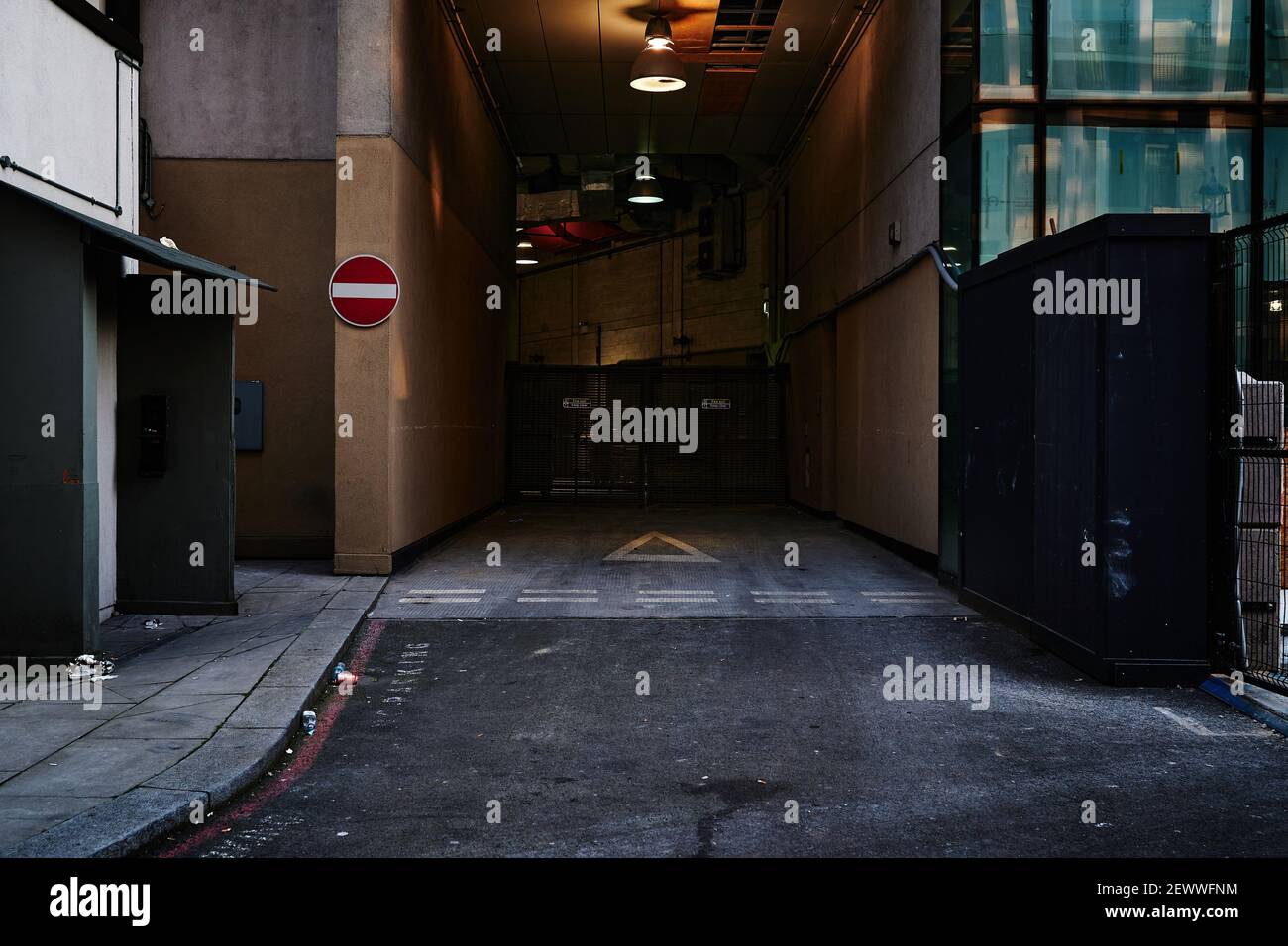 London, UK - 28 Feb 2021 : garage doorway in evening with a no entry sign Stock Photo