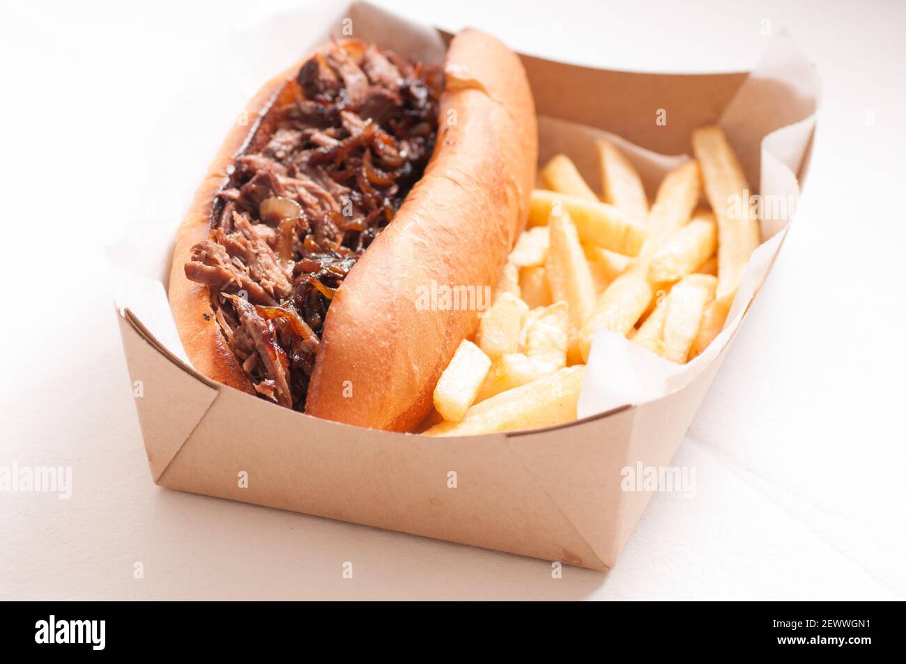 classic french dip au jus or beef dip with fries and sauteed onions