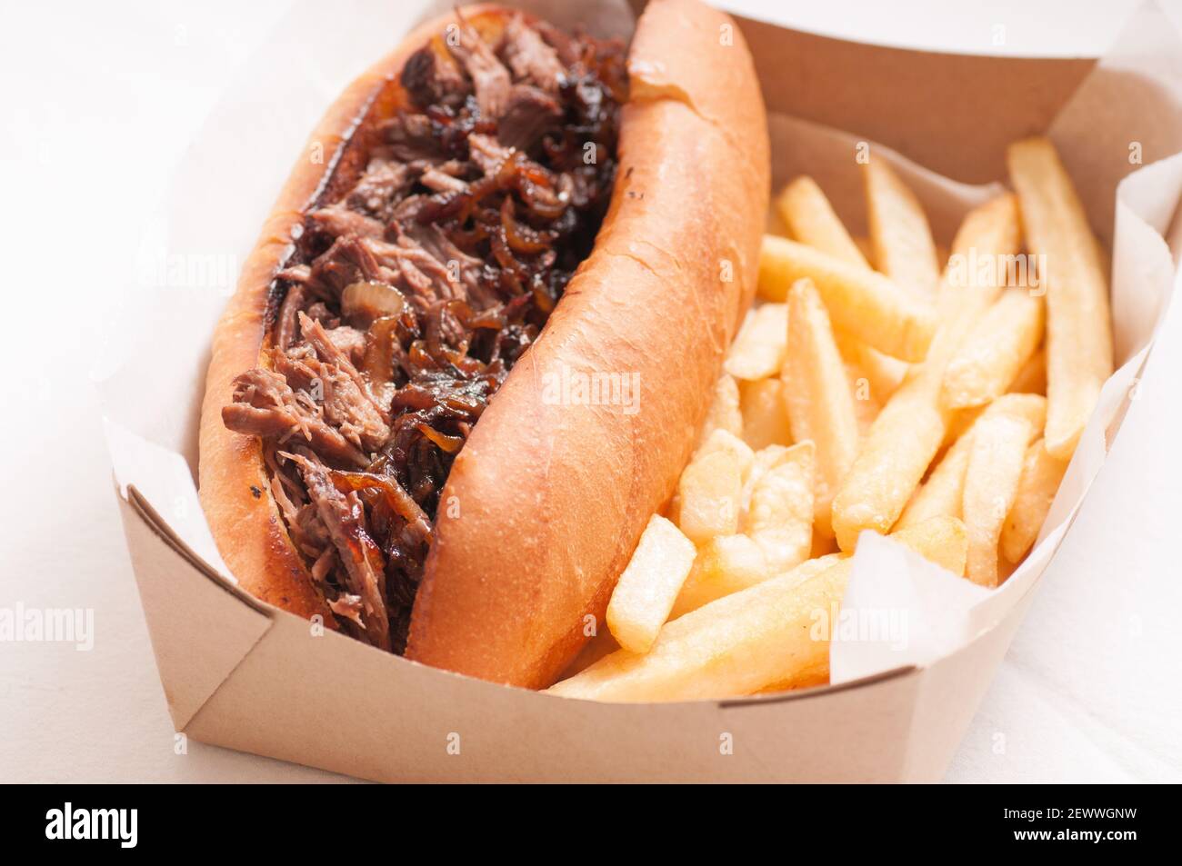 classic french dip au jus or beef dip with fries and sauteed onions