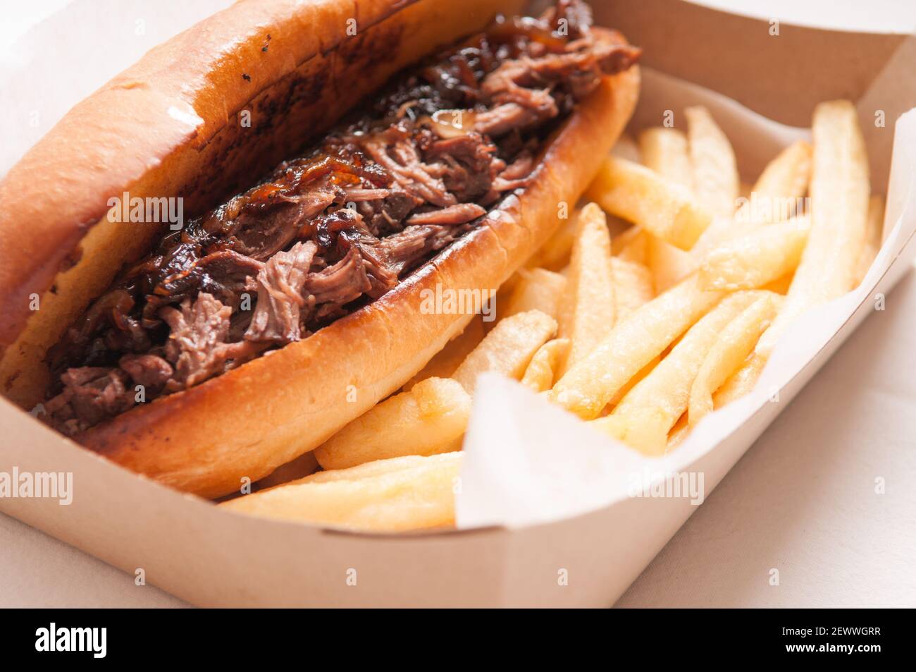 classic french dip au jus or beef dip with fries and sauteed onions