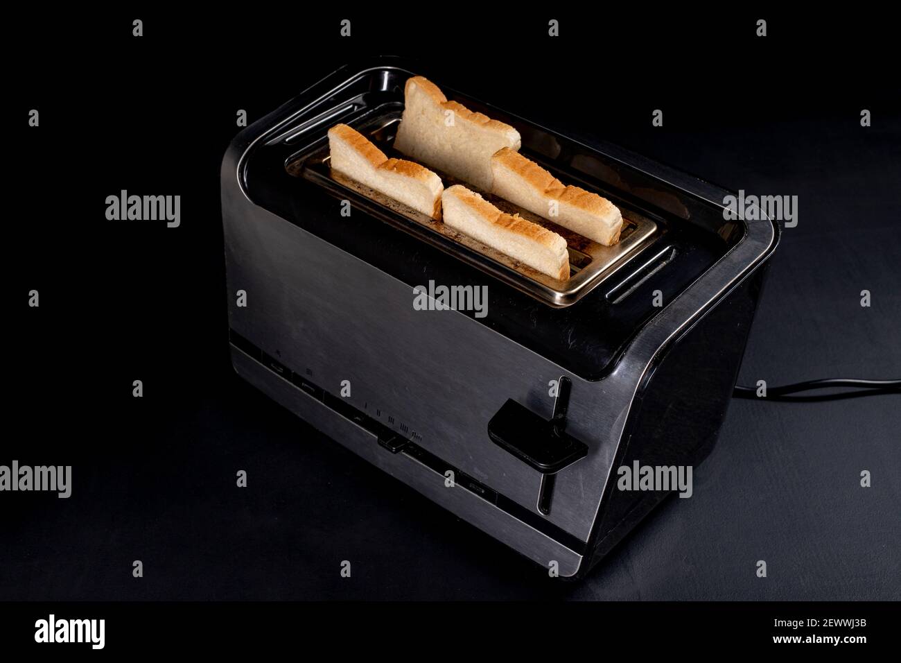 A modern toaster for toasting bread. Domestic electrical appliance for