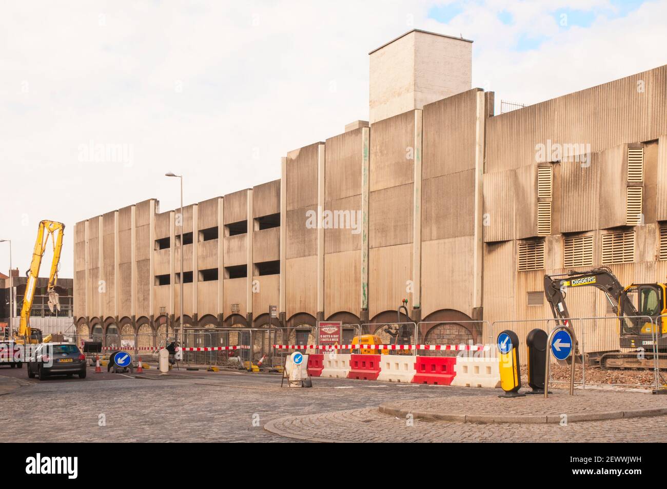 Single lane traffic due to lane closure and safety fencing alongside Wilko store and multi storey car park before demolition is started Blackpool Uk Stock Photo