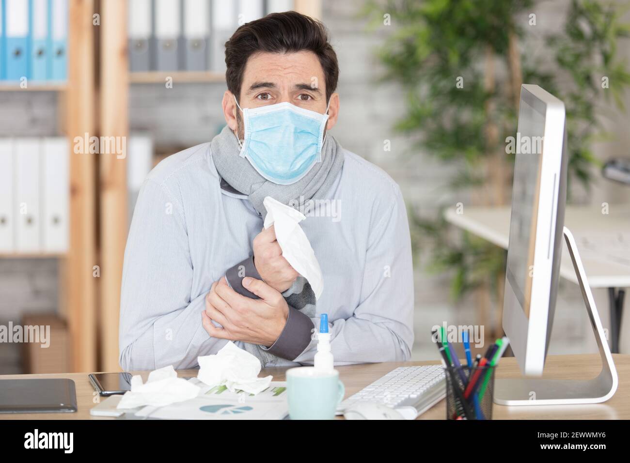 Woman wearing face mask typing hi-res stock photography and images - Alamy