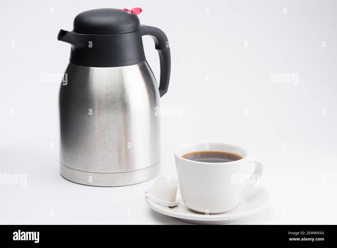 Coffee mug with coffee jar on a white background Stock Photo