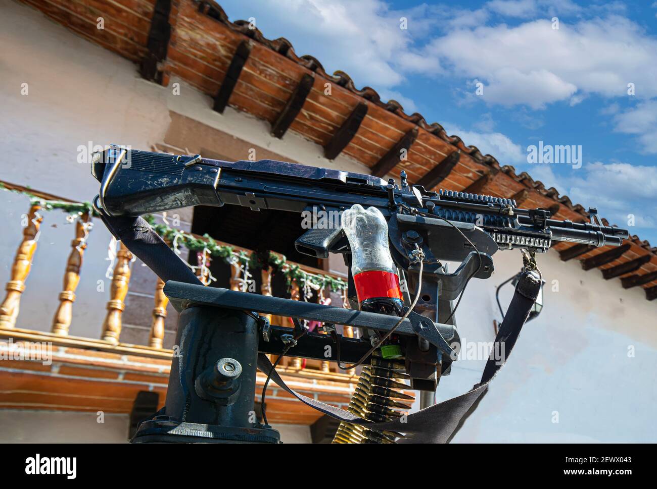 Mexico, Taxco police car with machine gun guarding local streets and providing security against Mexican cartels. Stock Photo