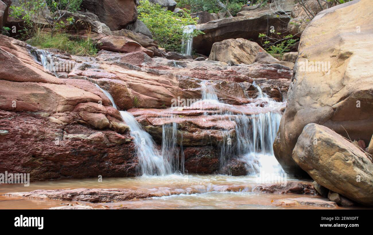 A beautiful view of waterfalls over rocks with long exposure in the ...