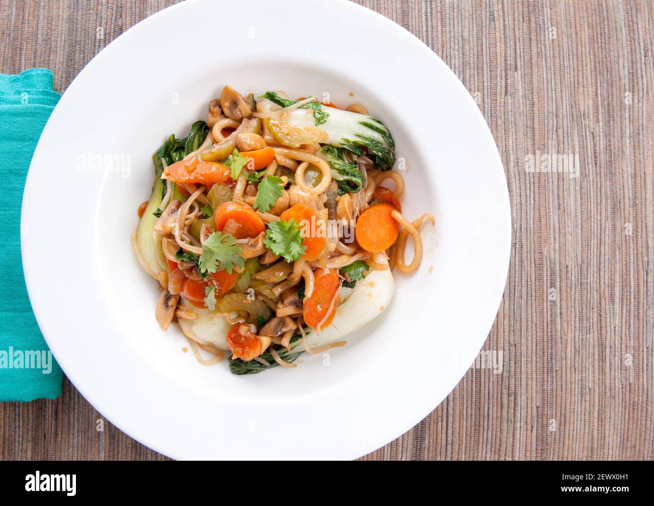 vegetable stir fry with udon noodles and bok choy Stock Photo Alamy