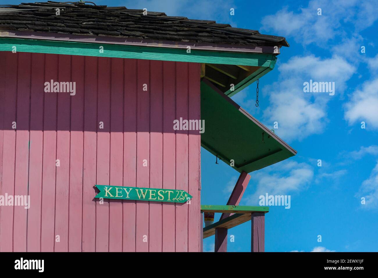 A pink lifeguard station stands out on the beach of the MiamiDade