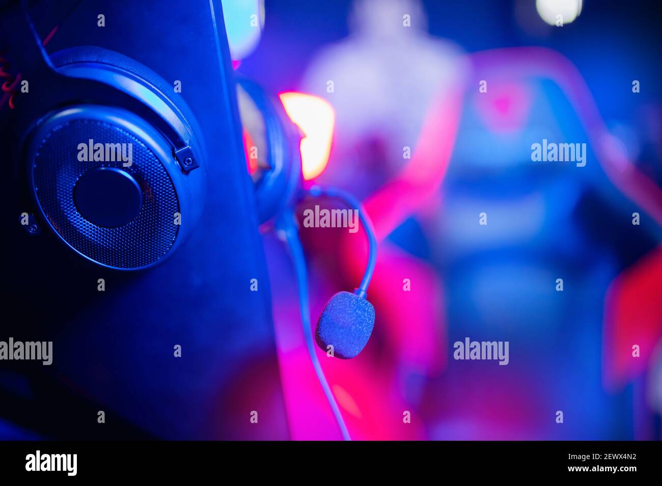 Headphones with microphone for video games and cyber sports on neon