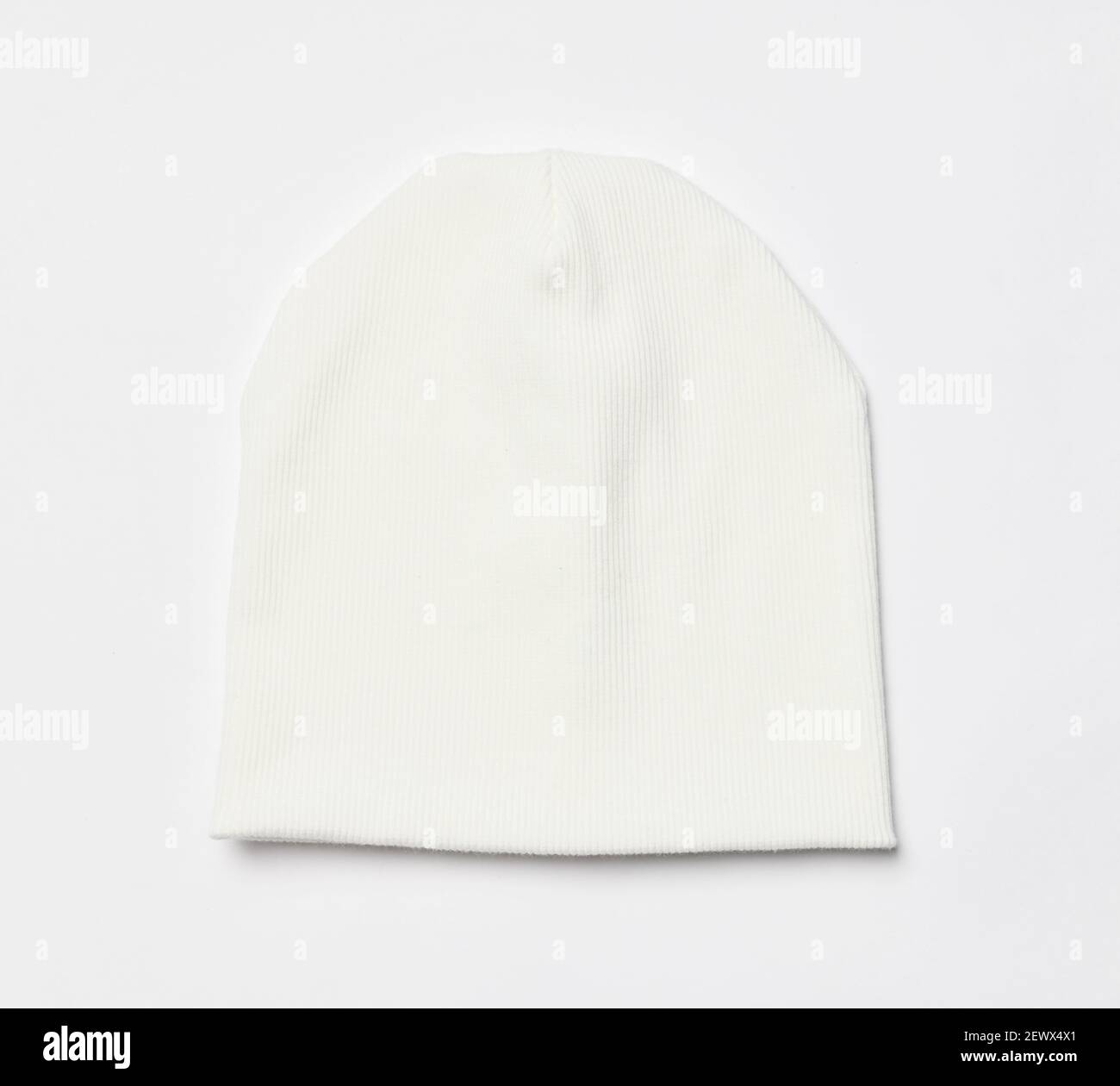 Modern knitted white beanie hat, knitwear isolated on white Stock Photo ...