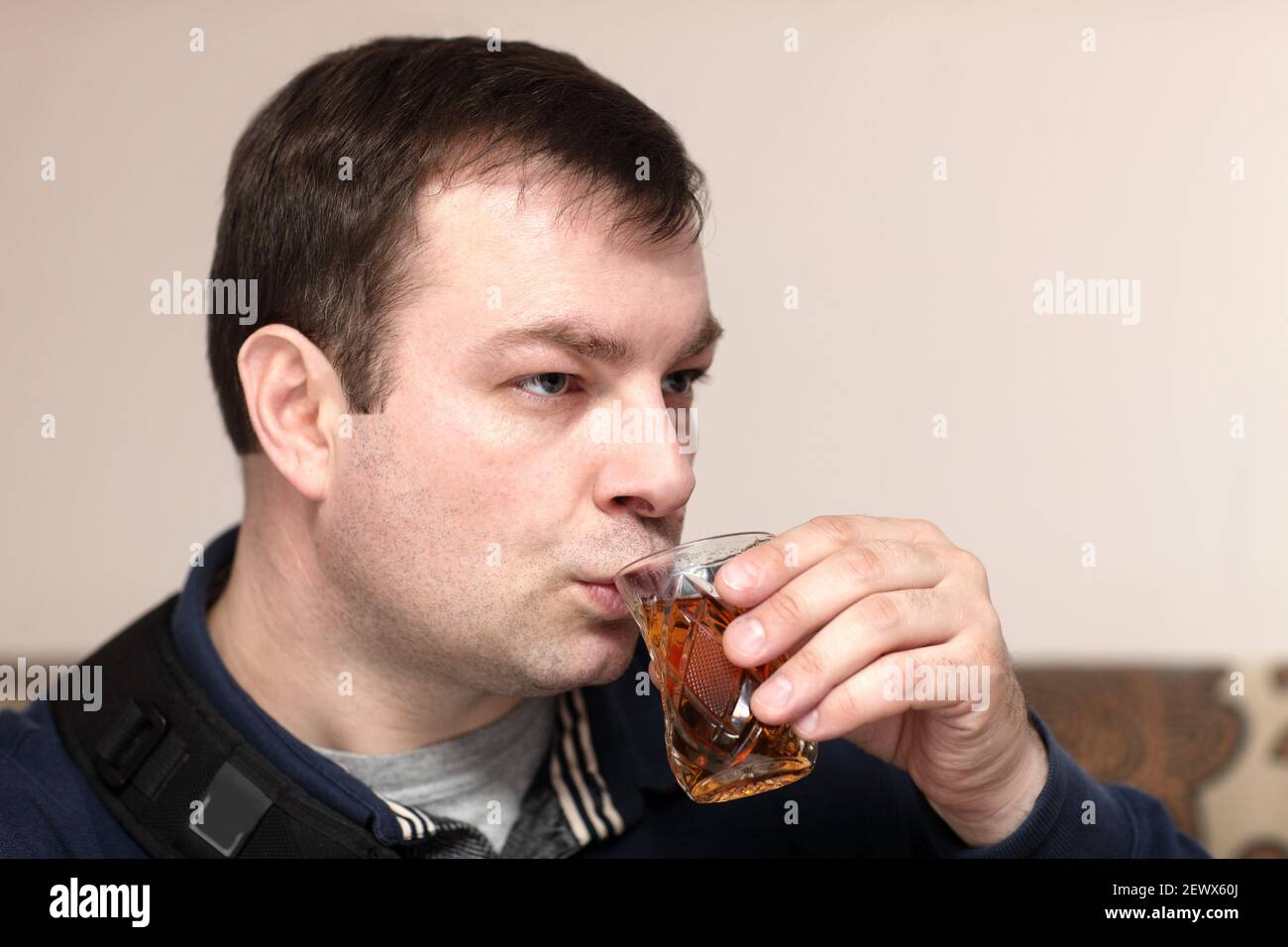 Man drinking black tea in the cafe Stock Photo Alamy