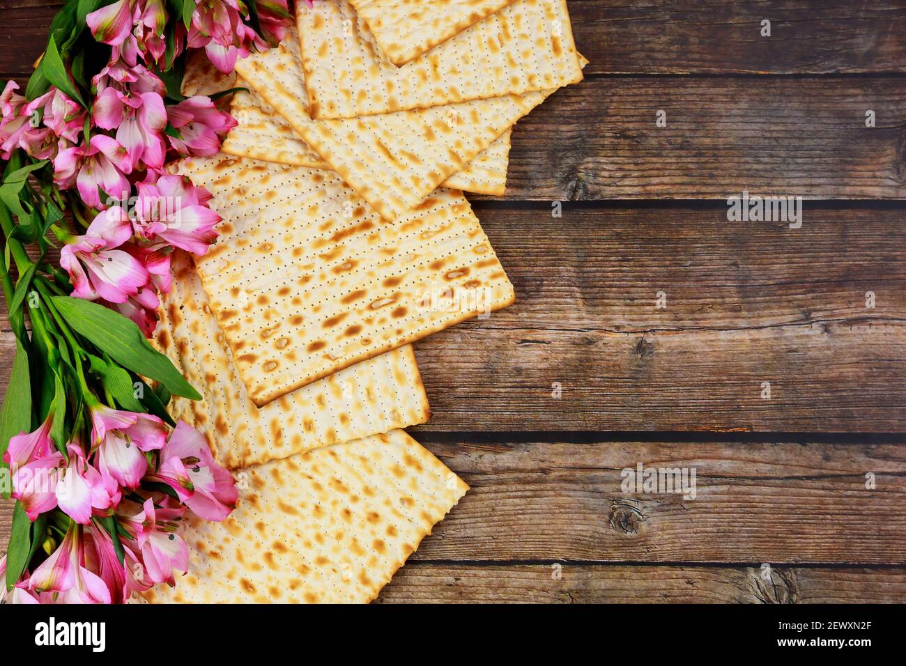 Jewish matzah bread on wooden rustic background. Passover holiday ...