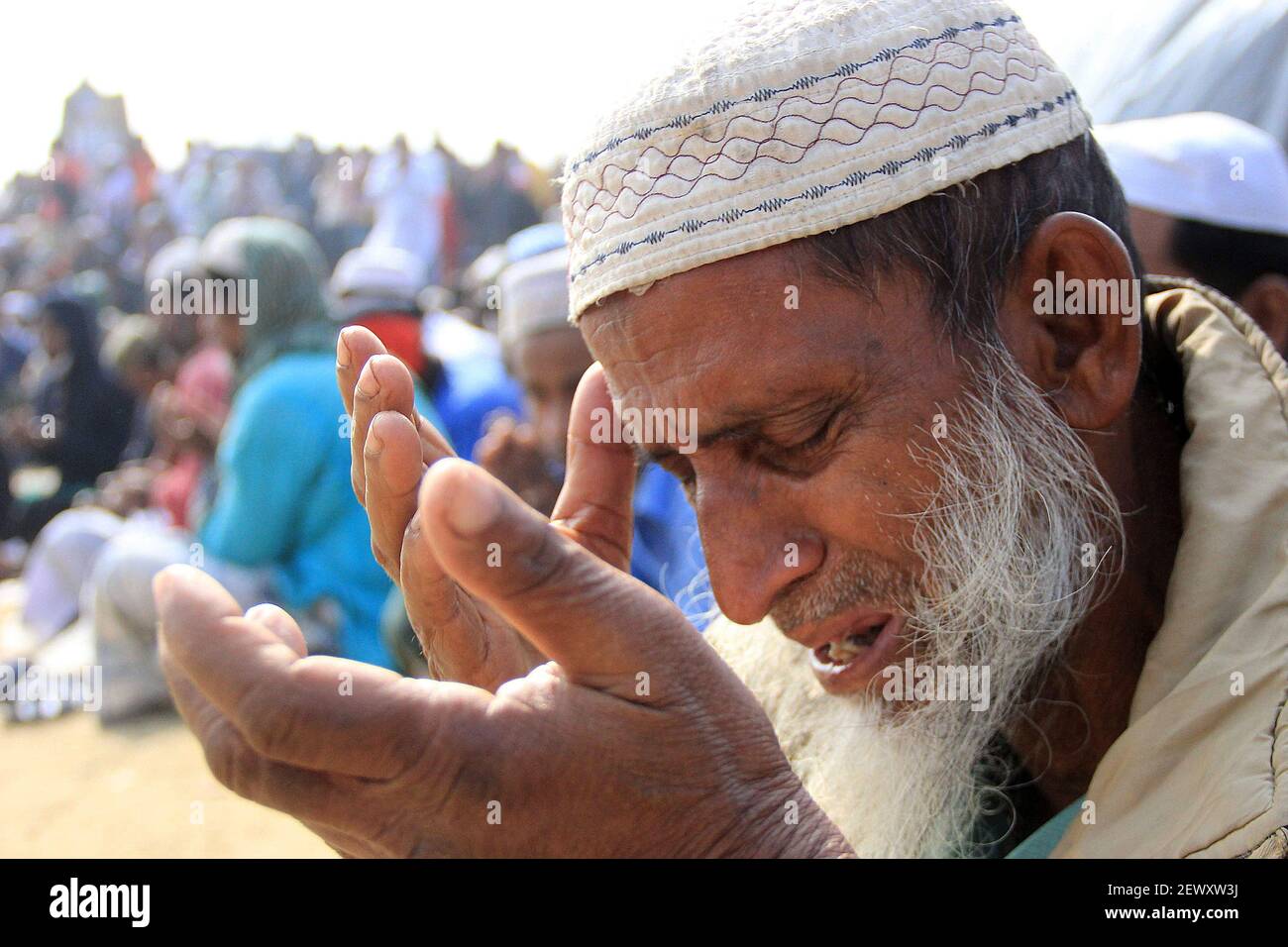 A Muslim participates in Akheri Munajat, or last prayers, at the conclusion of the Biswa Ijtema or World Muslim Congregation in Tongi, near Dhaka, Bangladesh on January 11, 2015. Muslims joined a prayer on the banks of a river in Bangladesh as the world's third largest annual Islamic congregation ended. (Photo by Palash Khan *** Please Use Credit from Credit Field *** Stock Photo
