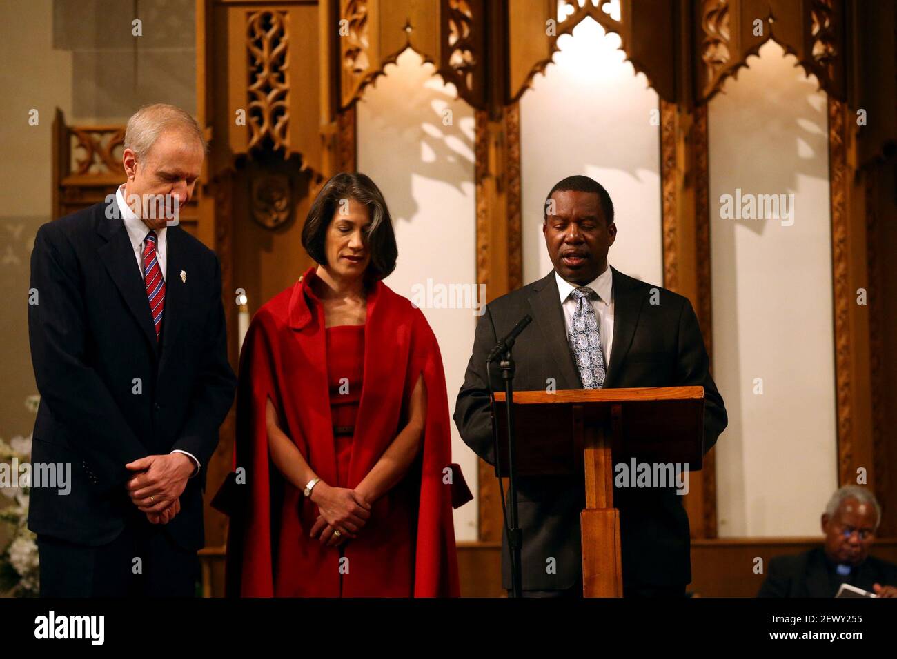 Bruce Meeks Rev. James Meeks prays with Gov.-elect Bruce Rauner and his wife Diana ...