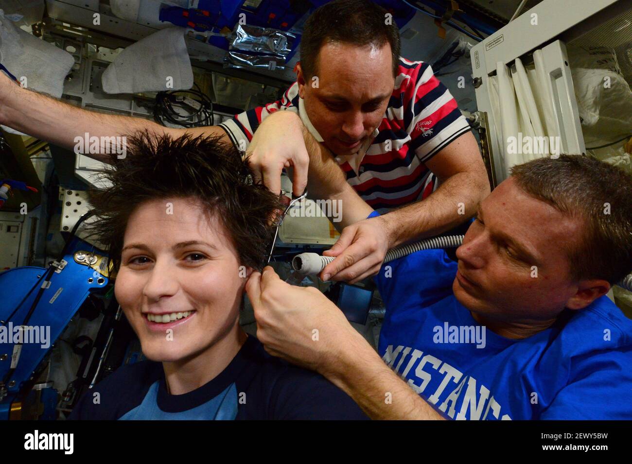 A New Year's haircut for ESA astronaut Samantha Cristoforetti in the  challenging weightlessness of the International Space Station. Samantha's  ISS Expedition 42 crewmate, NASA astronaut Terry Virts, puts his pre-flight  haircutting training