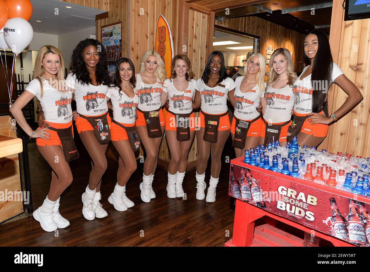 Hooter waitresses pose during the Hooters Manhattan VIP/Press Preview Hooter waitresses pose during the Hooters Manhattan VIP/Press Preview