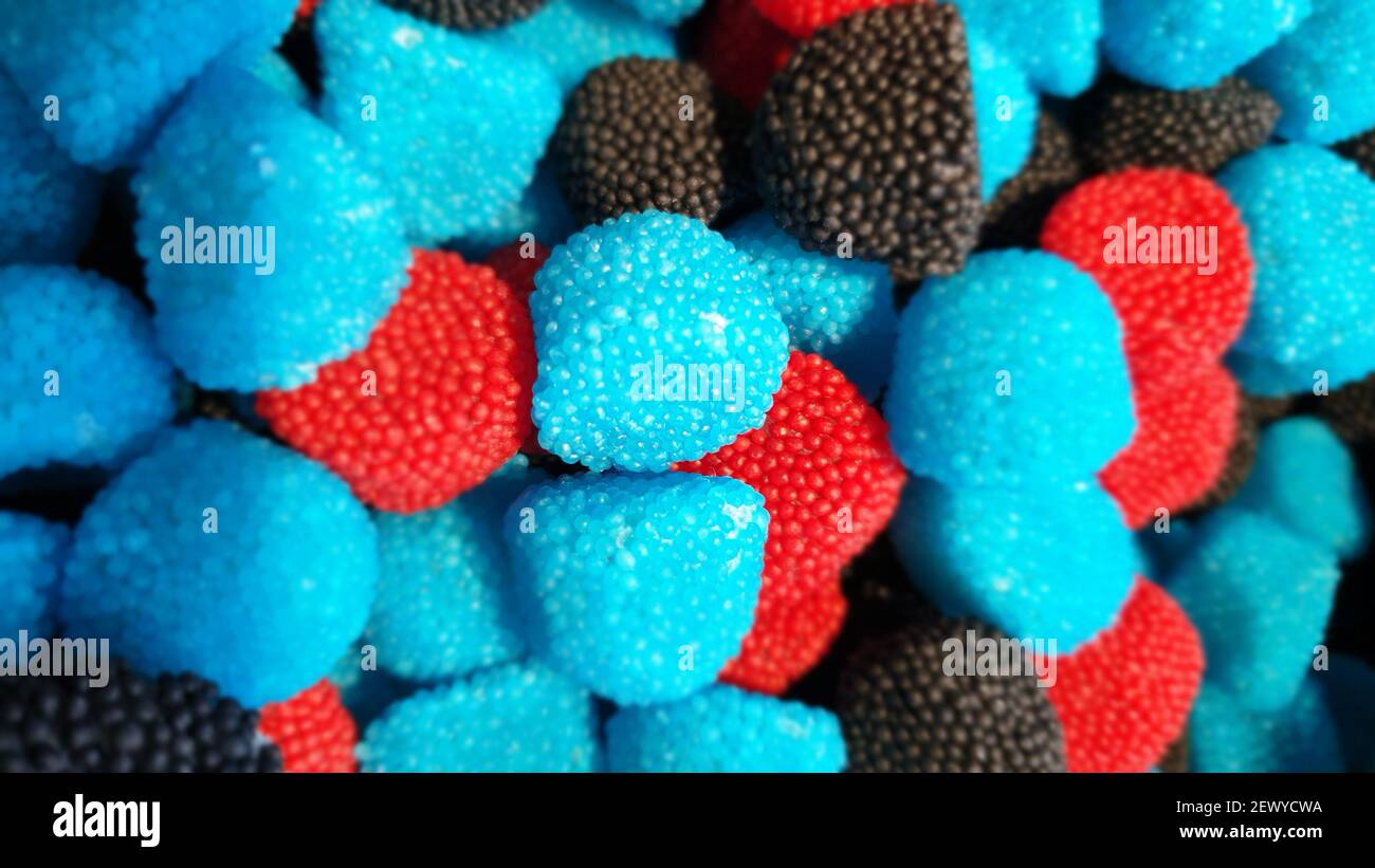 Sweets in a shape of raspberries. Fake raspberry Stock Photo - Alamy