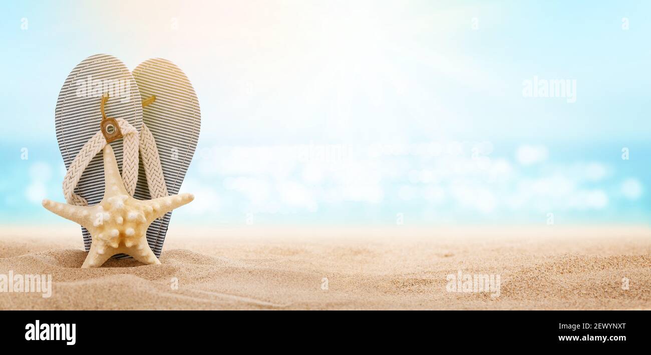 Flip flops on sunny sea beach with copy space. Summer sea vacation and ...