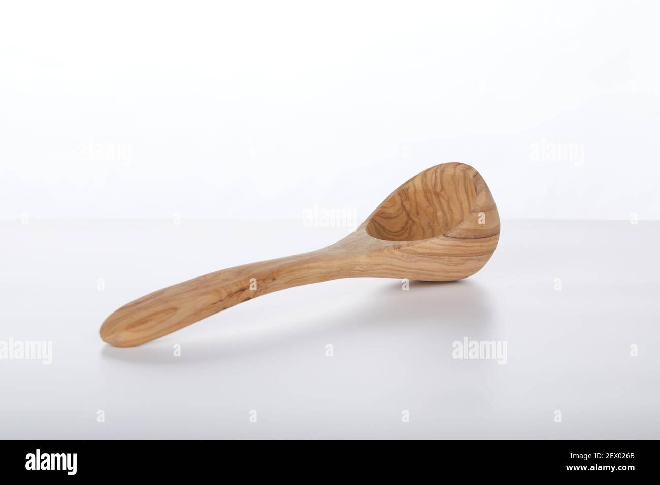 Handmade artisan crafted olive wood Wooden scoop spoon ladle isolated