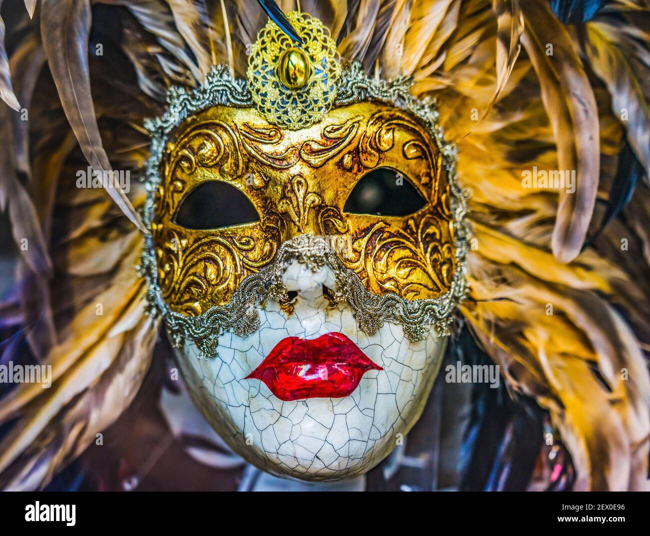 White Golden Venetian Mask Feathers Venice Italy Used since 1200s for Carnival.  Also used for Mardi Gras Stock Photo