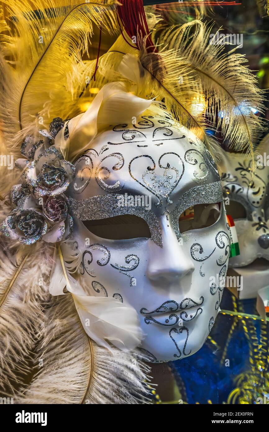 White Venetian Mask Feathers Venice Italy Used since 1200s for Carnival.  Also used for Mardi Gras Stock Photo