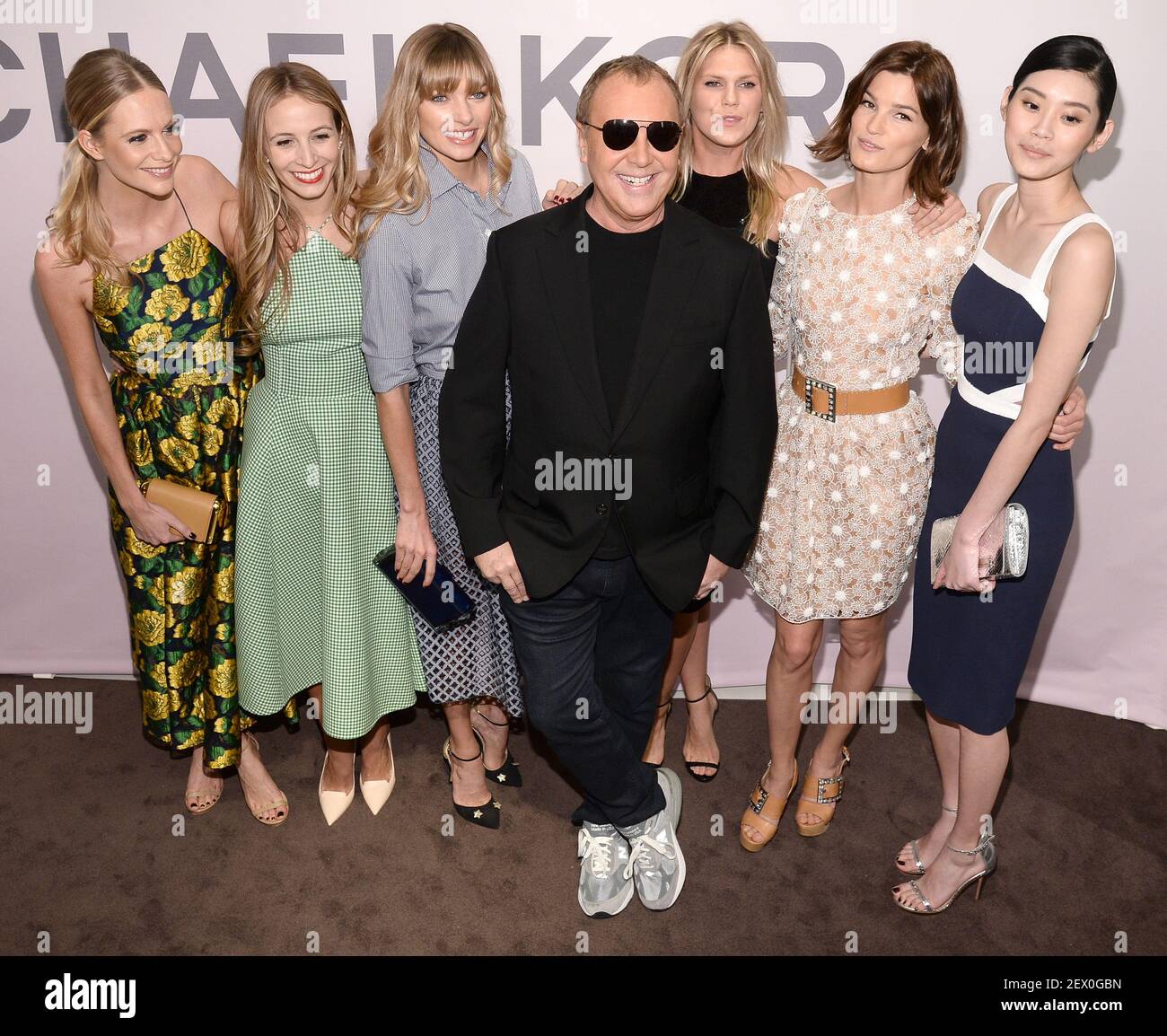 (L-R) Poppy Delevingne, Harley Viera-Newton, Jessica Hart, Michael Kors