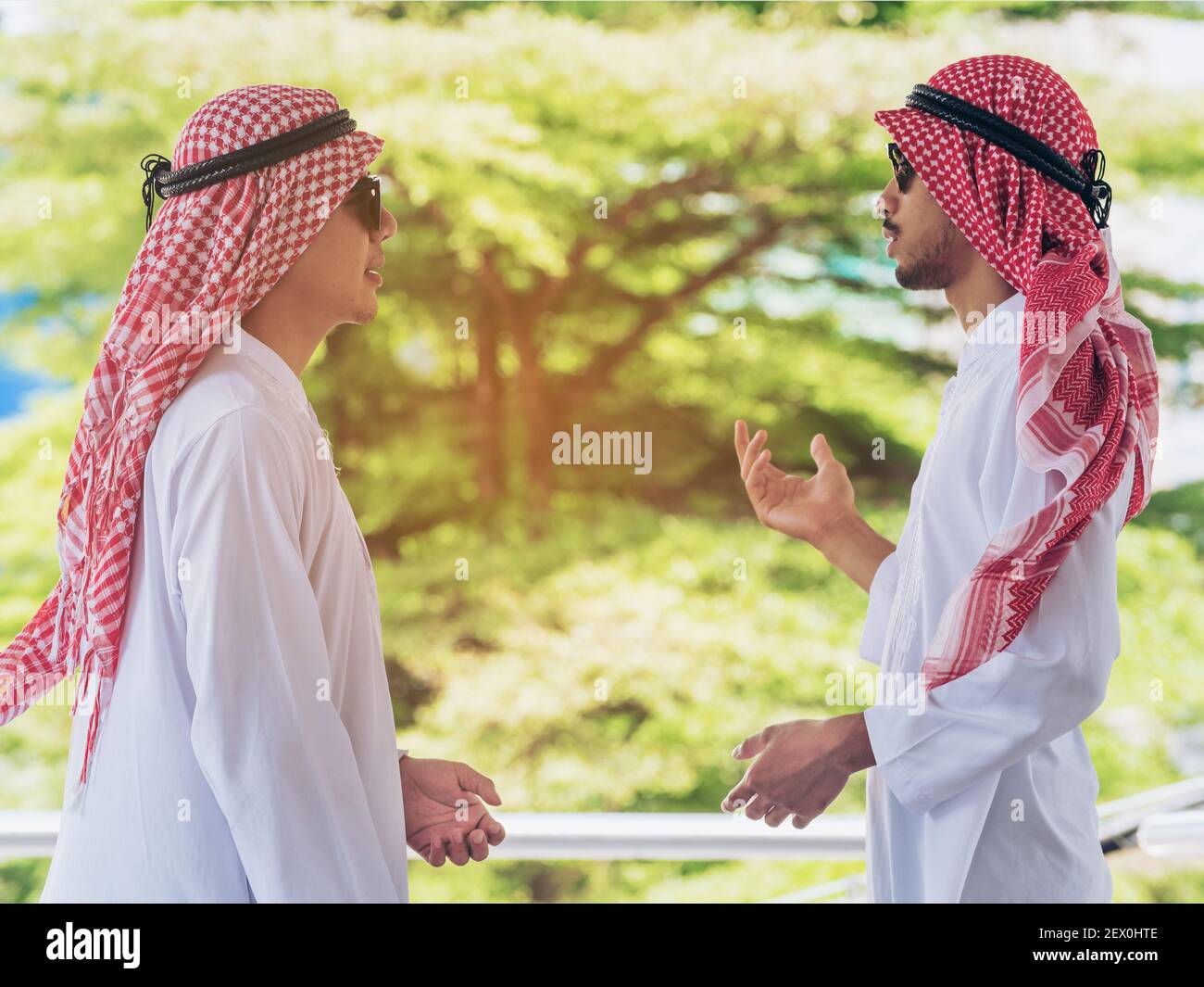 Two Arab men talking to each other. Business concept Stock Photo Alamy